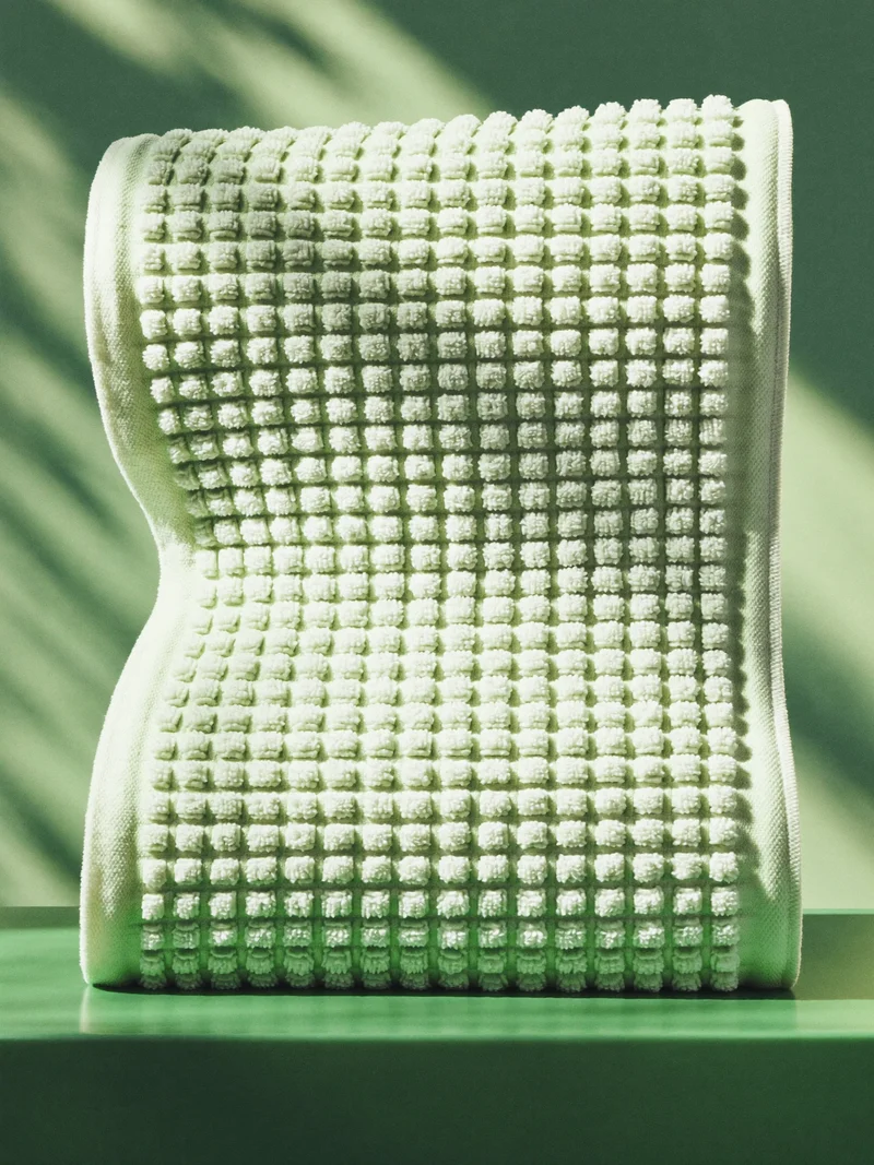 Studio illustrato: tessuto da bagno in cotone a coste